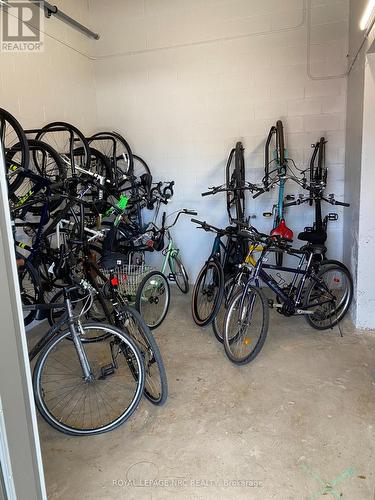 Main level bicycle storage. - 604 - 118 West Street, Port Colborne (Sugarloaf), ON - Indoor Photo Showing Garage
