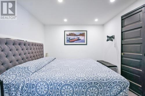 Beach House - Lower Level - Primary Suite - 203 Park Road, Tiny, ON - Indoor Photo Showing Bedroom