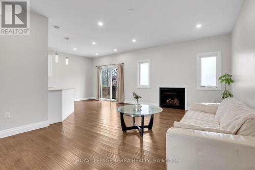 30 Bellehumeur Road, Tiny, ON - Indoor Photo Showing Living Room With Fireplace