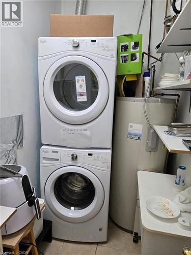 Stacked laundry appliances with front-load design - 9688 Leslie Street Unit# 16, Richmond Hill, ON 