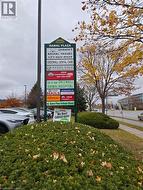 Ramal Plaza pylon sign featuring multiple tenant panels - 