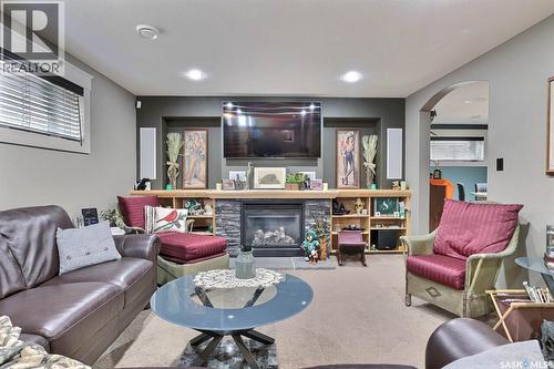 225 Willow Ridge Drive, Pilot Butte, SK - Indoor Photo Showing Living Room With Fireplace
