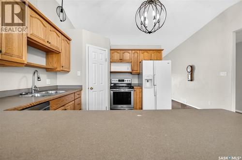 16 Flax Road, Moose Jaw, SK - Indoor Photo Showing Kitchen With Double Sink