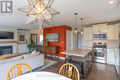 231 Campanale Way, Lucan Biddulph (Lucan), ON - Indoor Photo Showing Other Room With Fireplace