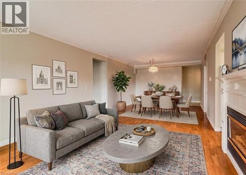 405 Erb Street W Unit# 507, Waterloo, ON - Indoor Photo Showing Living Room With Fireplace