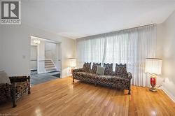 Hardwood flooring throughout the main living area - 
