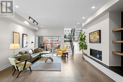 91 Hamilton Avenue N, Ottawa, ON - Indoor Photo Showing Living Room With Fireplace