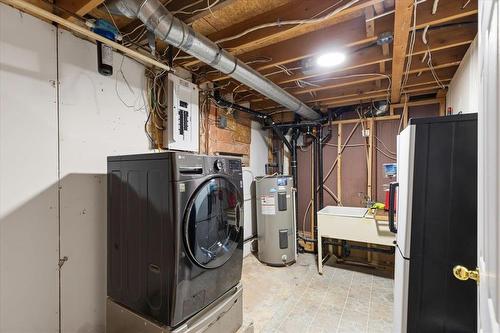 Newer 2 in 1 washer/dryer unit - 19 Hunter Crescent, Pinawa, MB - Indoor Photo Showing Laundry Room