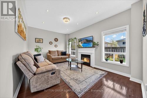 6 White Crescent, Barrie, ON - Indoor Photo Showing Living Room With Fireplace
