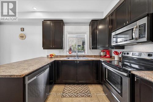 6 White Crescent, Barrie, ON - Indoor Photo Showing Kitchen With Double Sink