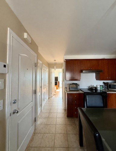 Mud Room - 9604 Rue De St-Firmin, Montréal (Ahuntsic-Cartierville), QC - Indoor Photo Showing Kitchen