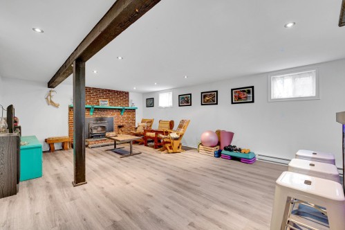 Family Room - 1239 6E Rue, Saint-Jérôme, QC - Indoor With Fireplace