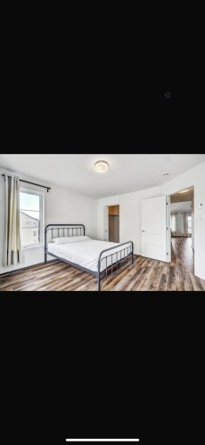 Chambre à coucher principale - 7-7200 Rue De Lunan, Brossard, QC - 