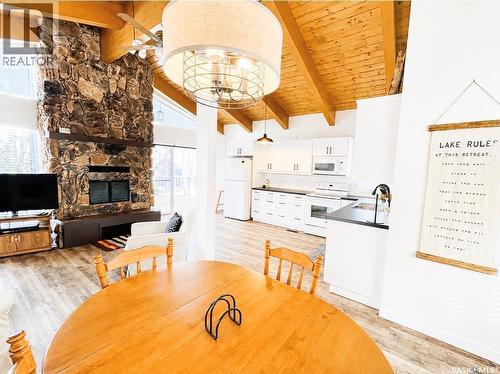 45 Mainprize Bay, Maple Bush Rm No. 224, SK - Indoor Photo Showing Dining Room With Fireplace