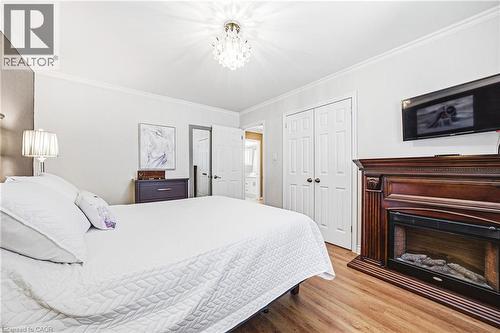 2231 Sandringham Drive, Burlington, ON - Indoor Photo Showing Bedroom With Fireplace
