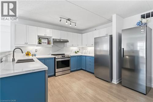 1340 Main Street E Unit# 113, Milton, ON - Indoor Photo Showing Kitchen With Stainless Steel Kitchen With Double Sink With Upgraded Kitchen