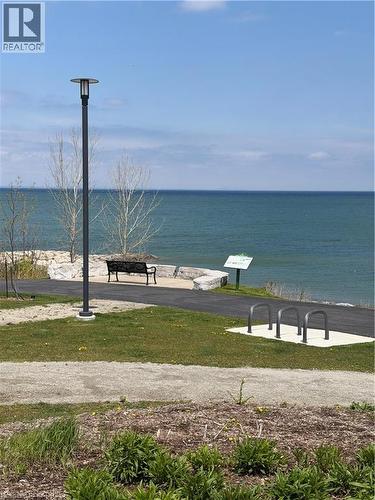 Waterfront pathway featuring a park - 16 Concord Place Unit# 648, Grimsby, ON 