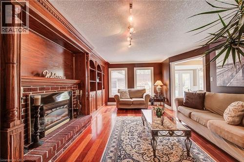 48 Lennox Crescent, Kitchener, ON - Indoor Photo Showing Living Room With Fireplace