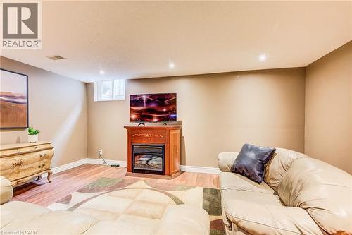 48 Lennox Crescent, Kitchener, ON - Indoor Photo Showing Basement With Fireplace