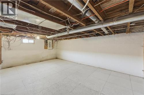 Unfinished basement featuring exposed wood joists, ductwork, and various utility lines - 2934 Baker Road, Niagara Falls, ON - Indoor Photo Showing Basement