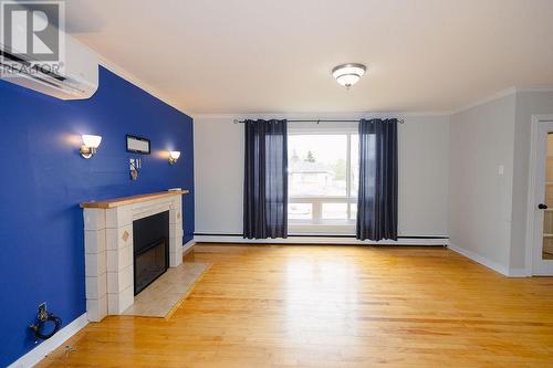 54 Hawker Crescent, Gander, NL - Indoor Photo Showing Other Room With Fireplace