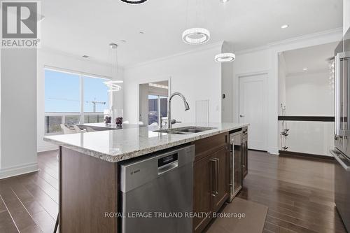 Upper: Kitchen Island great for Entertaining - 1403 - 240 Villagewalk Boulevard, London North (North R), ON - Indoor Photo Showing Kitchen With Double Sink With Upgraded Kitchen