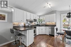 Updated kitchen with stainless appliances. - 