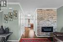 68 235 Rosewood Boulevard E, Saskatoon, SK  - Indoor Photo Showing Living Room With Fireplace 