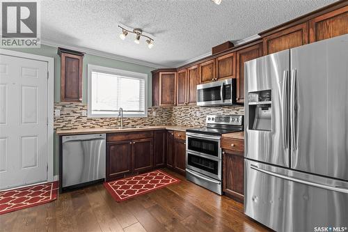 68 235 Rosewood Boulevard E, Saskatoon, SK - Indoor Photo Showing Kitchen With Upgraded Kitchen