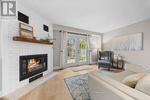 1122 St Germain Crescent, Ottawa, ON - Indoor Photo Showing Living Room With Fireplace