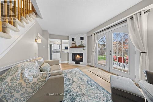 1122 St Germain Crescent, Ottawa, ON - Indoor Photo Showing Living Room With Fireplace
