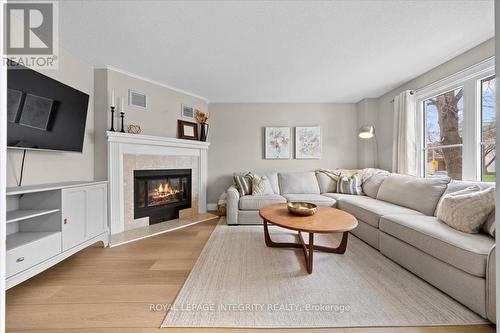 1122 St Germain Crescent, Ottawa, ON - Indoor Photo Showing Living Room With Fireplace