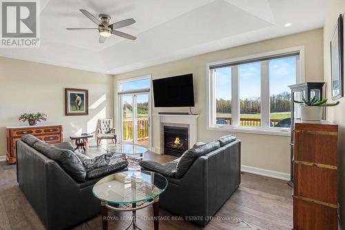 23 Senators Gate Drive, Perth, ON - Indoor Photo Showing Living Room With Fireplace