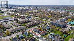 Aerial perspective showcasing the property's corner lot location - 