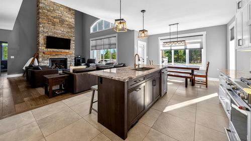 1461 Mcdonald Road, Cranbrook, BC - Indoor Photo Showing Kitchen With Fireplace With Upgraded Kitchen