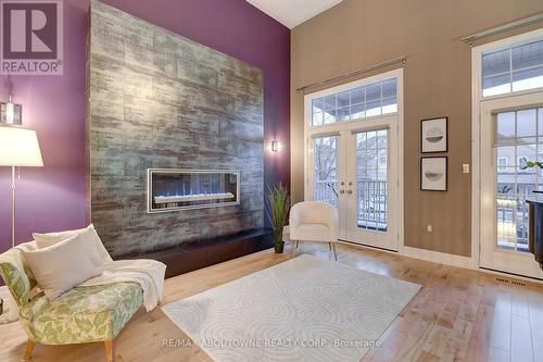 310 Leitch Landing, Milton, ON - Indoor Photo Showing Living Room With Fireplace