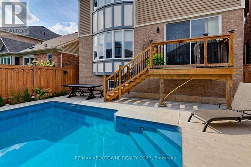 310 Leitch Landing, Milton, ON - Outdoor With In Ground Pool