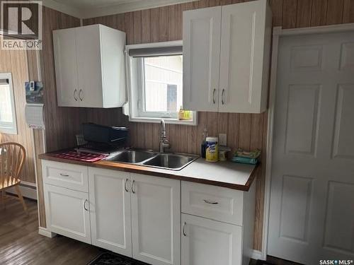 691 Joseph Crescent, Cochin, SK - Indoor Photo Showing Kitchen With Double Sink