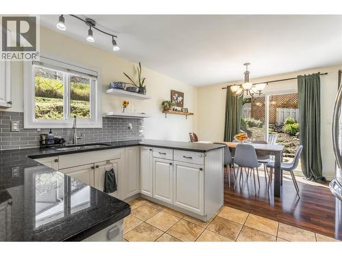 Ample counter space - 1385 Orchard Drive, Kelowna, BC - Indoor Photo Showing Living Room