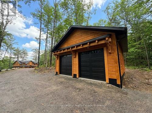 15 - 1213 Camp Jackson Road, Muskoka Lakes (Medora), ON - Indoor Photo Showing Living Room With Fireplace