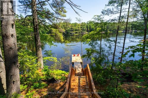 Stairs to waterfront - 15 - 1213 Camp Jackson Road, Muskoka Lakes (Medora), ON - Outdoor With Body Of Water With View
