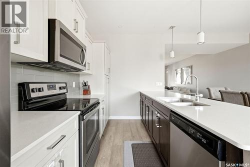 4217 E Keller Avenue, Regina, SK - Indoor Photo Showing Kitchen With Stainless Steel Kitchen With Double Sink With Upgraded Kitchen