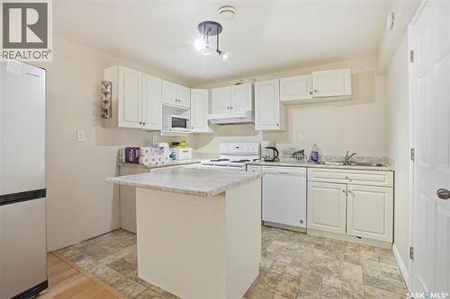 1113 Wilson Crescent, Saskatoon, SK - Indoor Photo Showing Kitchen With Double Sink