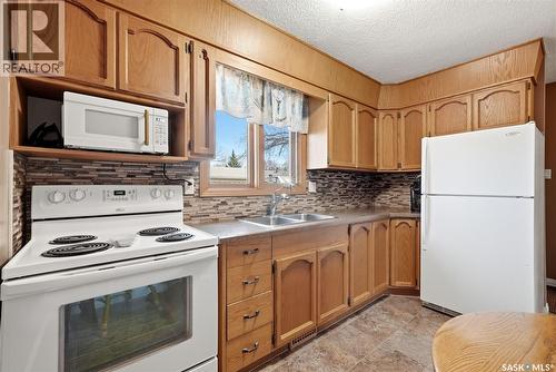 41 Spruceview Road, Regina, SK - Indoor Photo Showing Kitchen With Double Sink