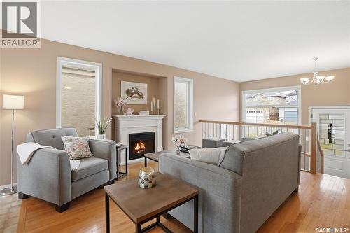 1642 Wingert Drive, Regina, SK - Indoor Photo Showing Living Room With Fireplace