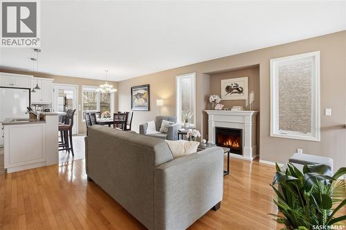1642 Wingert Drive, Regina, SK - Indoor Photo Showing Living Room With Fireplace