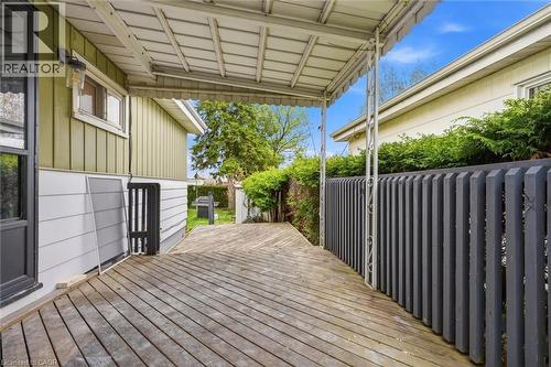 Covered outdoor deck with wood-finish flooring - 16 Ronaldshay Avenue, Hamilton, ON - Outdoor With Deck Patio Veranda With Exterior
