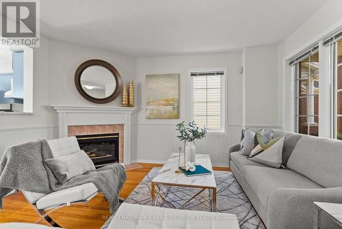 106 Bloomingdale Street, Ottawa, ON - Indoor Photo Showing Living Room With Fireplace