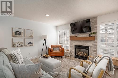 1159 Barclay Circle, Milton, ON - Indoor Photo Showing Living Room With Fireplace