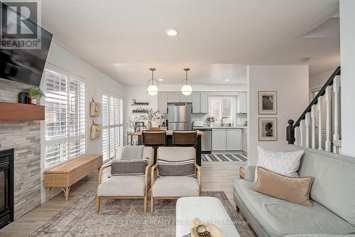 1159 Barclay Circle, Milton, ON - Indoor Photo Showing Living Room With Fireplace